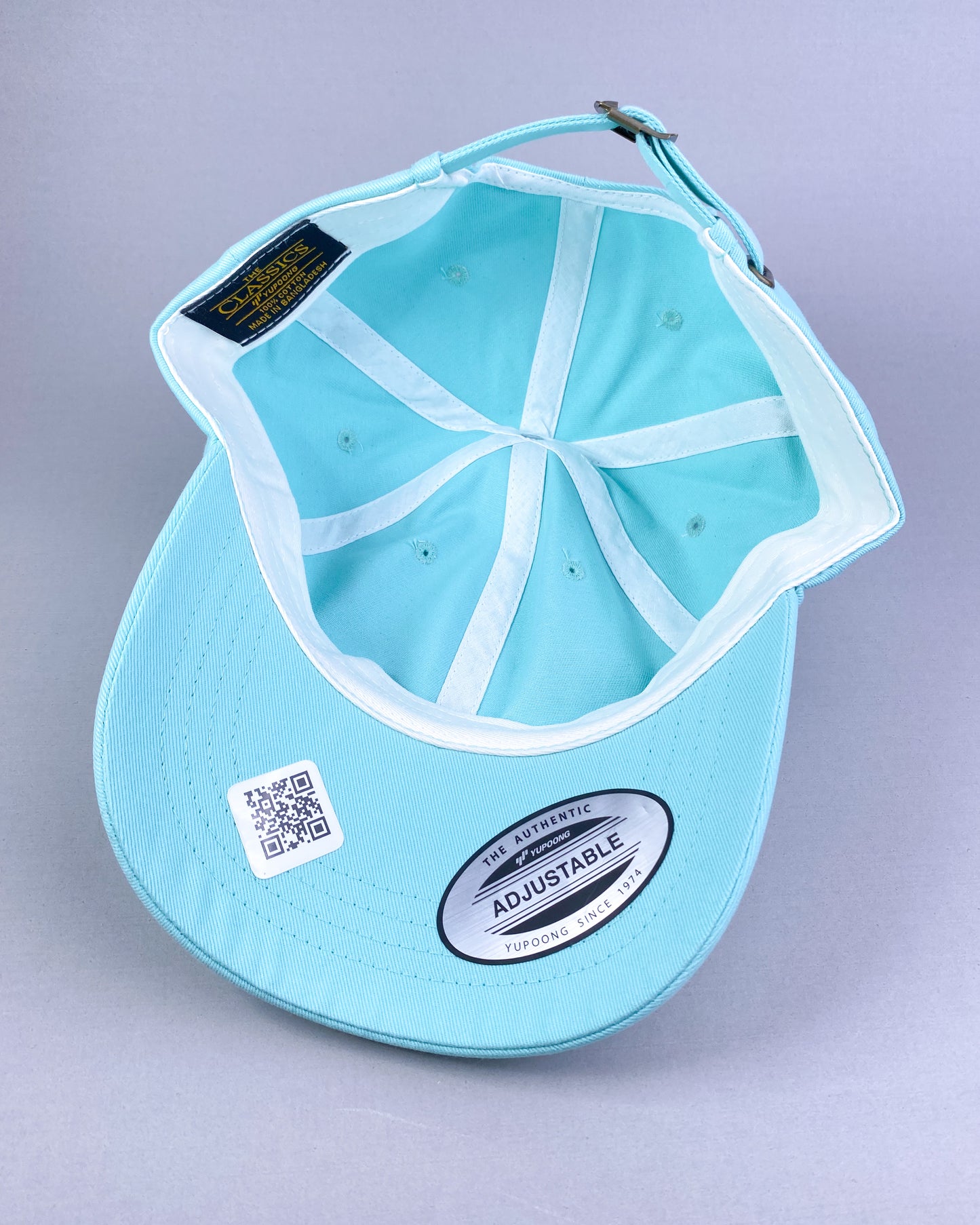 Bravo Premium hat in teal with single palm design leather patch