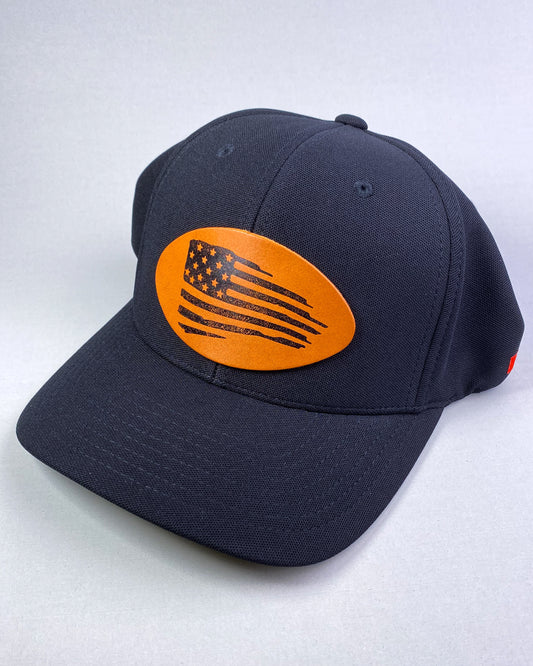distressed flag patch on black Flexfit 110 hat