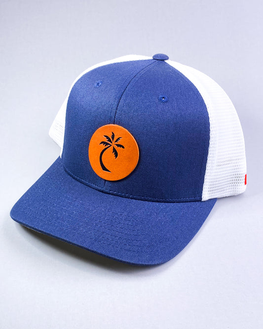 Bravo Premium hat in navy blue/white with single palm design leather patch