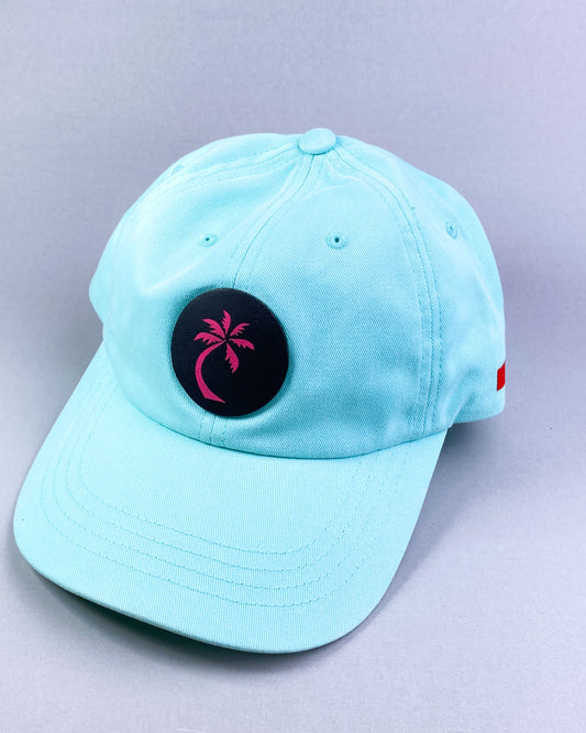 Bravo Premium hat in teal with single palm design leather patch