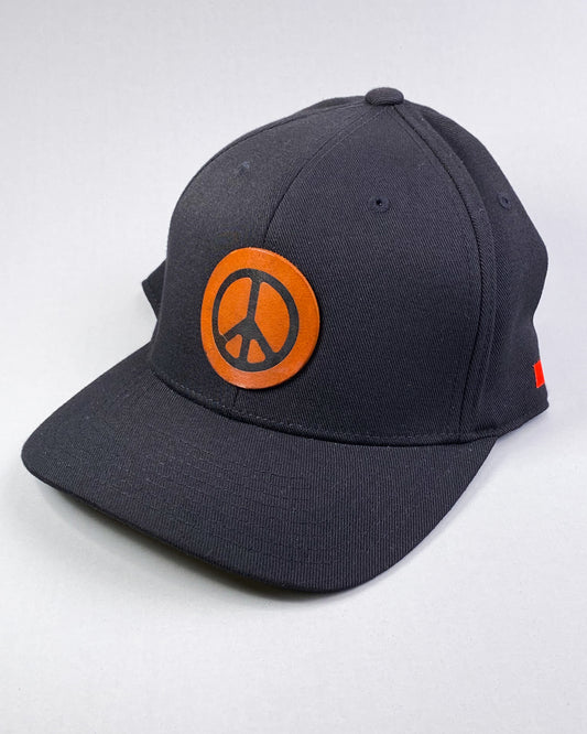Bravo Premium hat in black with peace sign design leather patch