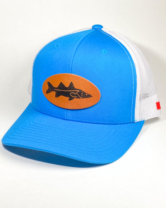 Bravo Cay hat in turquoise/white mesh with snook themed design leather patch