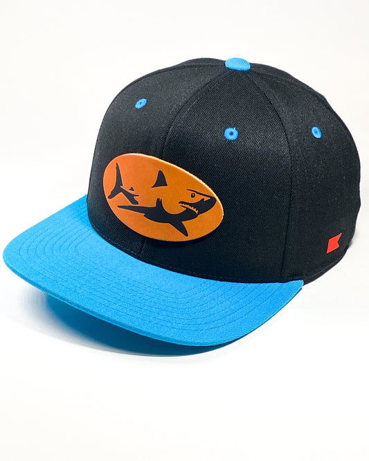 Bravo Cay hat in teal/black with shark design leather patch