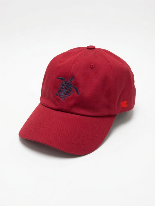 Bravo Cay hat in cranberry red with embroidered sea turtle design