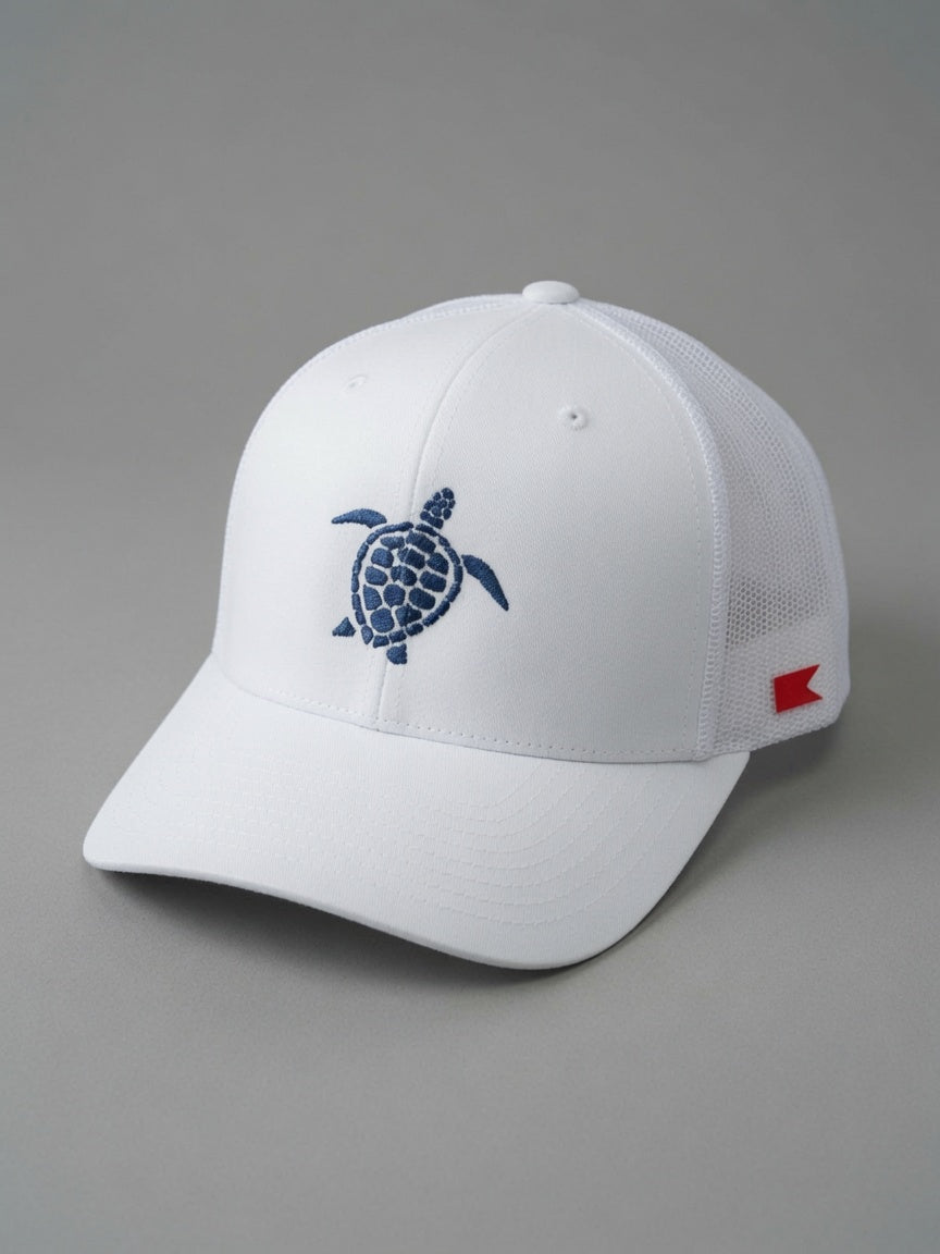 Bravo Cay hat in white with embroidered sea turtle design in navy