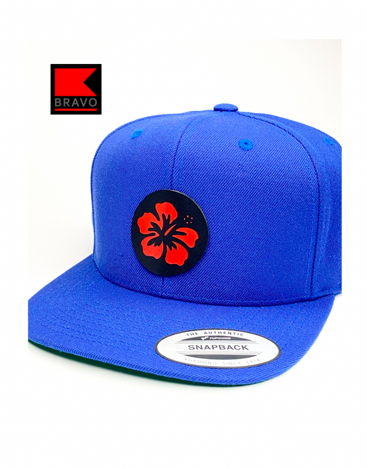 Bravo Cay hat in royal blue with flower design leather patch