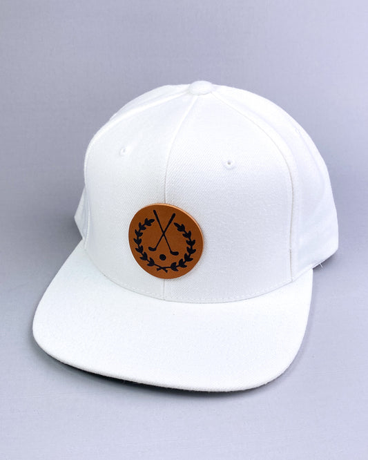 Bravo Premium hat in white with golf themed design leather patch