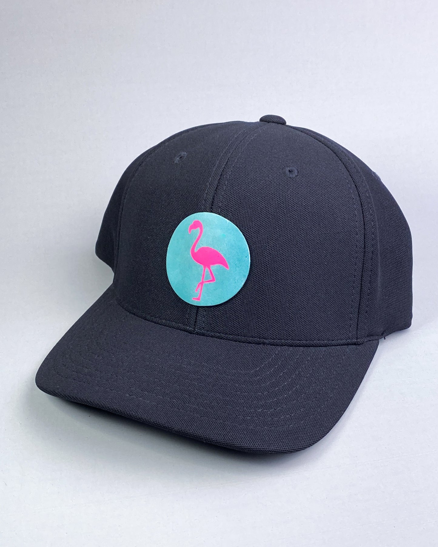 Bravo Cay hat in black with flamingo design leather patch