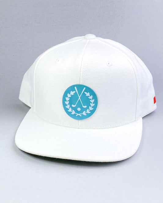 Bravo Cay hat in white with golf themed design leather patch