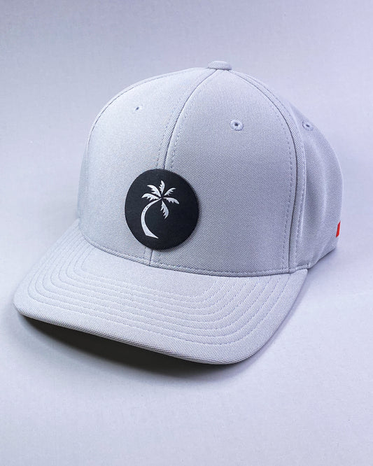 Bravo Cay hat in silver grey with single palm design leather patch