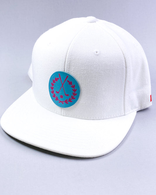 Bravo Cay hat in white with golf themed design leather patch